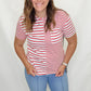 Woman wearing a red and white striped shirt and blue jeans on a white background