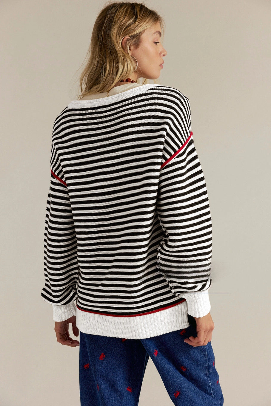 Black & White Striped Sweater with Red Accents