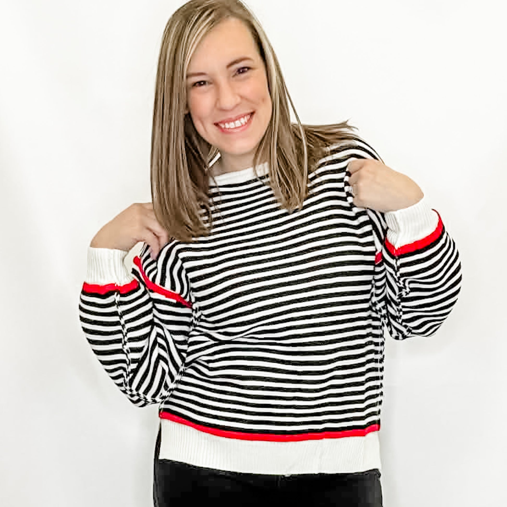 Black & White Striped Sweater with Red Accents