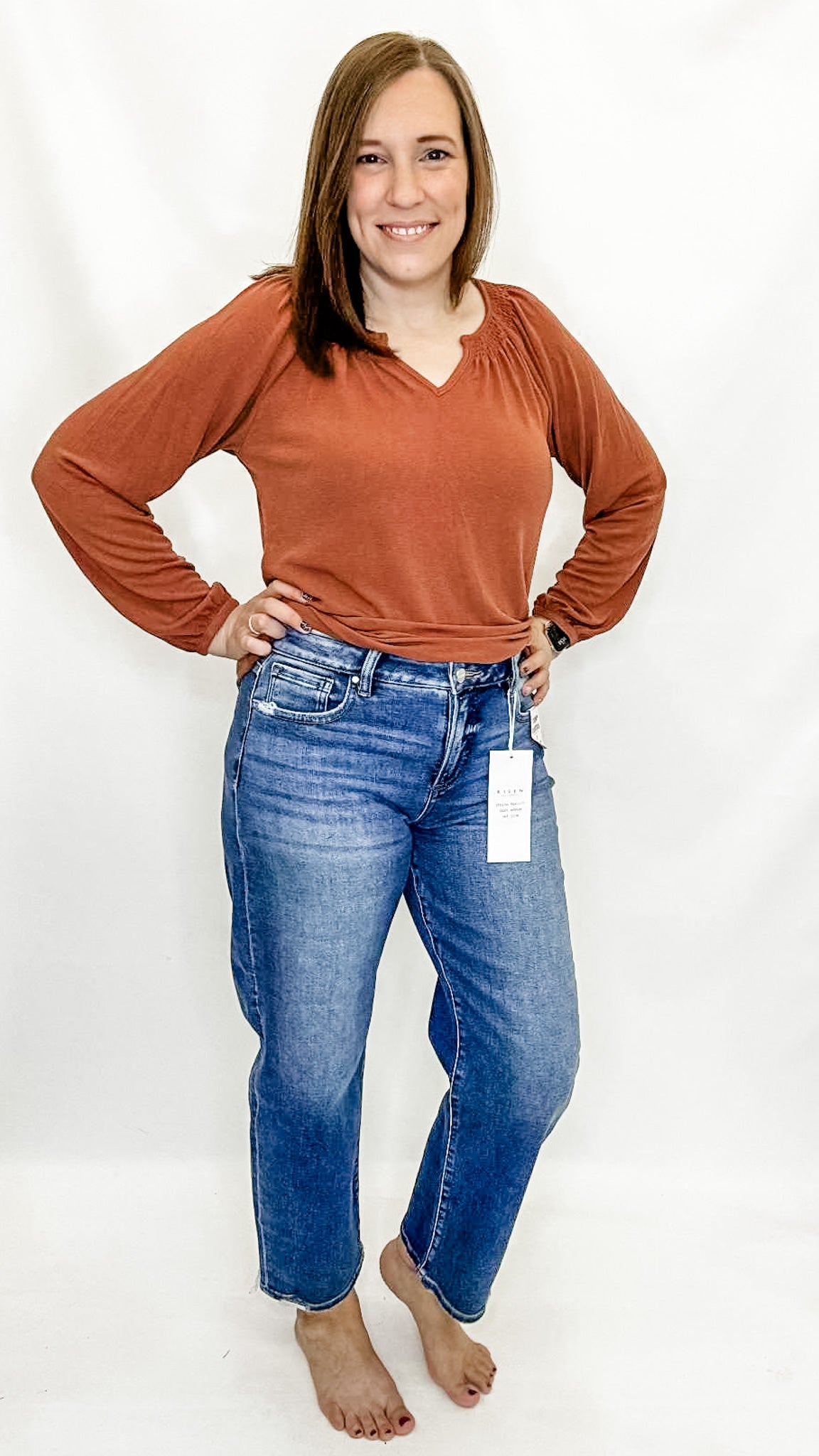 Rust Smocked Sholder V-Neck Top. Staccato