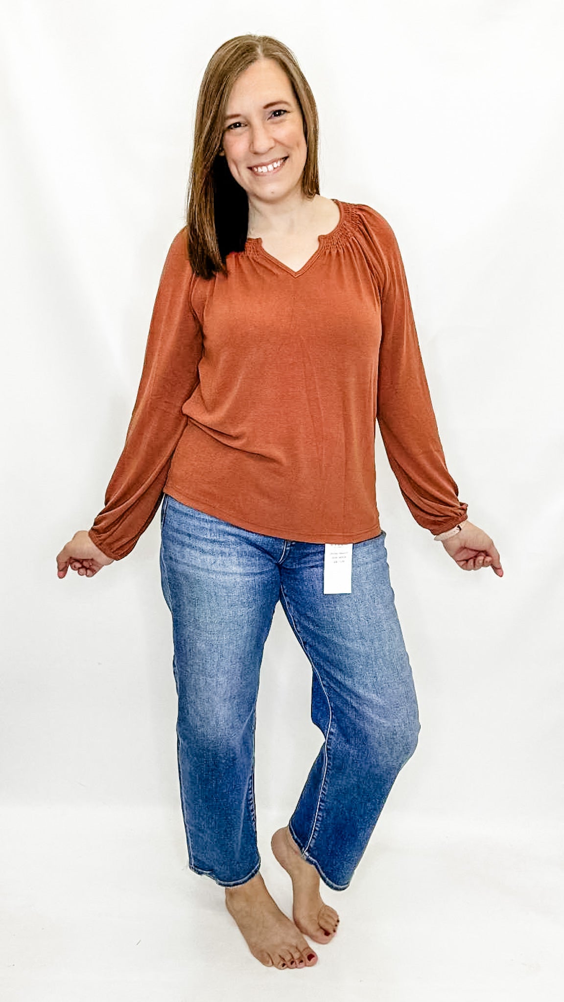 Rust Smocked Sholder V-Neck Top. Staccato