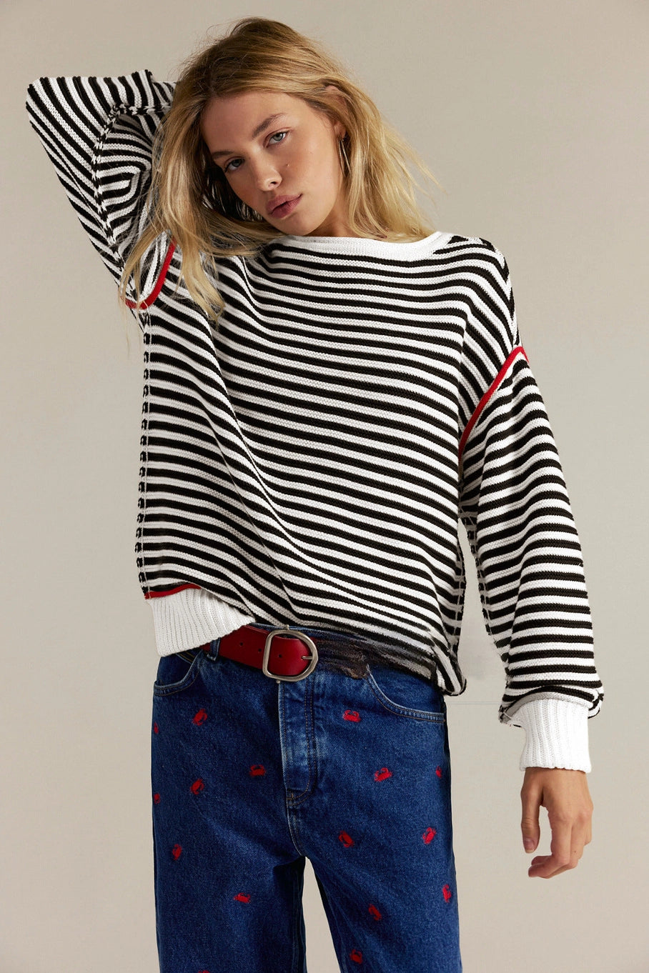 Black & White Striped Sweater with Red Accents